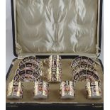 A cased set of six Royal Crown Derby Imari pattern coffee cans and saucers,