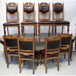 An Edwardian mahogany extending oval table on tapering reeded supports to castors,