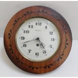 A 20th century Russian mahogany-cased wall clock, the cream dial set with Arabic numerals, 34cm.