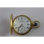 T Russell; an 18ct gold half hunter pocket watch with subsidiary dial.