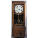 A Simplex oak-cased clocking-in clock with brass plaque stating 'The Gledhill-Brook Time Recorders