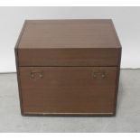 A mid/late 20th century sapele mahogany folding drinks cabinet opening to reveal a mirrored shelf