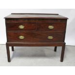 An Edwardian mahogany two-over-one long drawer chest, on block supports,