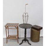 An Edwardian bamboo side table, a Lloyd Loom style linen basket,