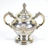 A late 19th/early 20th century Portuguese .833 silver twin handled lidded urn on spreading