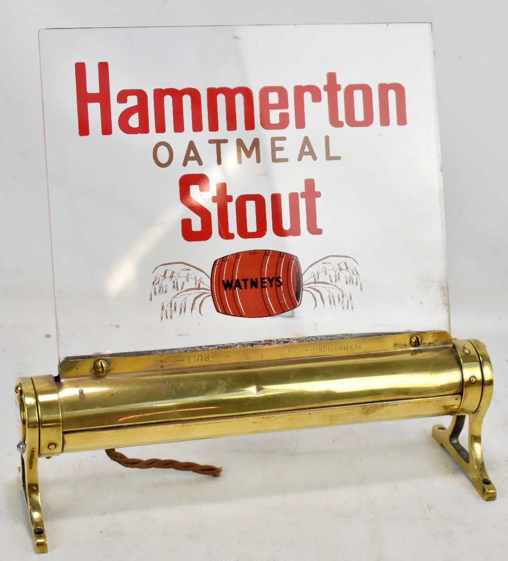 A vintage 'Watney's Hammerton Oatmeal Stout' bar advertising sign, the brass base inscribed '