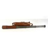 HCR & SON; a military issued three draw telescope with stitched leather body and in leather