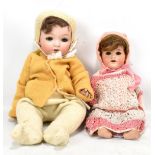 ARMAND MARSEILLE; a bisque headed doll, height 39cm, with a German bisque headed doll (2).