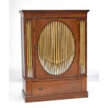 An unusual mahogany wardrobe, the front constructed using organ pipes, fitted with a hanging rail