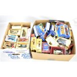 A quantity of assorted boxed cars to include Corgi, Lledo, Matchbox, etc.