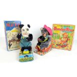 Two vintage battery operated toys including 'Fishing Polar Bear' and 'Grandpa Bear', each fitted