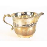 MANOAH RHODES & SONS LTD; a George V hallmarked silver cream jug with central band with chased