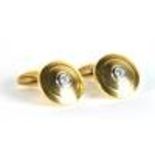 BOODLE & DUNTHORNE; a pair of 18ct yellow gold, white gold and diamond set cufflinks of target form,