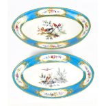 SEVRES; a pair of 18th century oval shaped bowls, with Bleu Celeste border, cisele gilding and