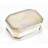 An unmarked Continental white metal and mother of pearl set snuff box of rectangular form, with