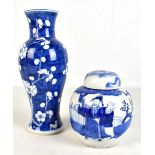 A Chinese blue and white porcelain vase painted with prunus, bears Kangxi four character mark to