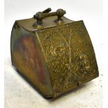 A late Victorian brass coal scuttle, the hinged cover with repoussé decoration of squirrels in a