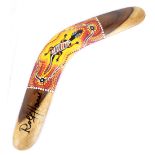ROLF HARRIS; a signed original Australian boomerang, decorated with a gecko, with certificate of