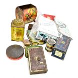 A collection of tins including Peek Frean's Biscuits, Bulwark Cut Plug Tobacco, OXO Cubes,