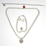 TIFFANY & CO; a bead necklace with heart shaped pendant, a matching bracelet, a further bracelet