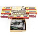 OXFORD RAIL; a small group of boxed OO gauge railway items comprising four steam locos, three wagons