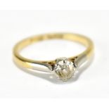 An 18ct yellow gold platinum tipped diamond solitaire ring, the stone weighing approx 0.25cts,