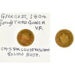 A George III 1/3 guinea with starburst counter stamp, 1804.