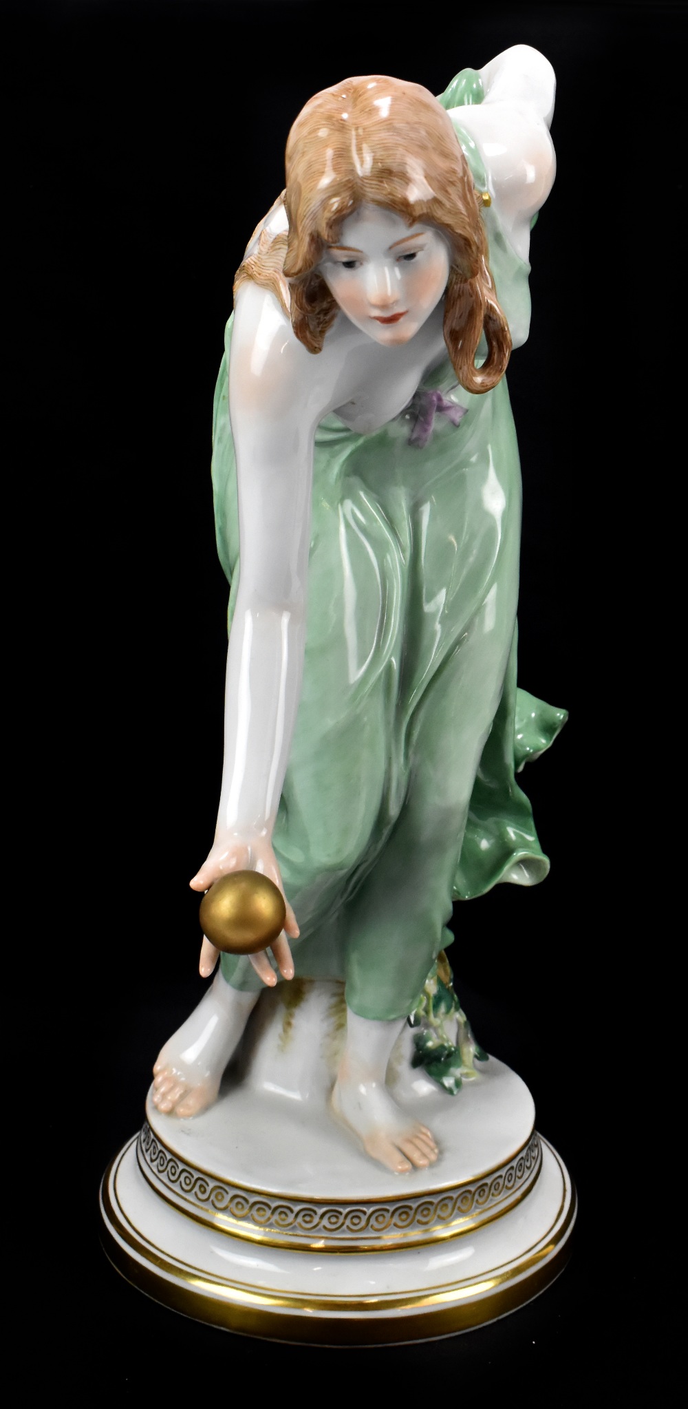 MEISSEN; a large figure 'Kugelspielerin', the boule player designed by Walter Schott circa 1900,