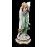 MEISSEN; a large figure 'Kugelspielerin', the boule player designed by Walter Schott circa 1900,