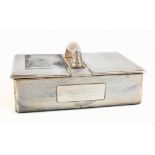 WILLIAM COMYNS; an Edward VII hallmarked silver two division cigar box with central carrying handle,