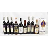 A mixed group of spirits including Martell Médillon Fine Champagne cognac, Gould Campbell 1985