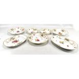 MEISSEN; a seven piece part dinner service comprising two oval platters, two circular dishes, two