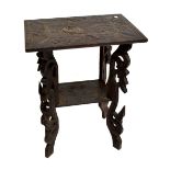 An early 20th century Burmese occasional table with carved peacock to top and further detail