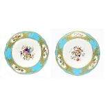 SEVRES; a pair of 18th century cabinet plates with Bleu Celeste border, cisele gilding and centred