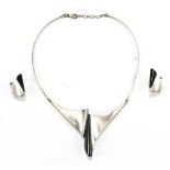 A vintage Modernist silver necklace, and a pair of matching earrings.
