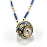 An Edwardian 18ct yellow gold champlevé blue enamelled ball watch with bezel wind and Swiss