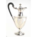 WALKER & HALL; a late Victorian hallmarked silver hot water jug, with hinged cover, urn shaped