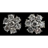 A pair of white metal diamond floral ear studs, estimated diamond weight approx 1.1ct, diameter