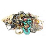 A small mixed group of costume jewellery including micromosaic floral brooch, bead necklaces,