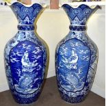 An enormous pair of 20th century Japanese blue and white vases with crimped necks and baluster