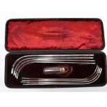 GEORGE COWIE; a cased Victorian hallmarked silver catheter set, with lubricating bottle, London