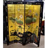 A 20th century black lacquered and gilt heightened four section folding Oriental screen, decorated