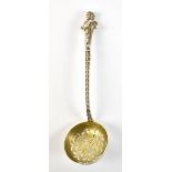 HENRY WILLIAM CURRY; a Victorian hallmarked silver sifting spoon with angel finial and gilt