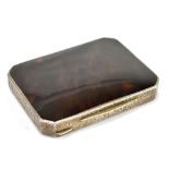 A mid-19th century Continental tortoiseshell and white metal mounted snuff box of rectangular