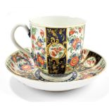 WORCESTER; an 18th century first period 'Wheat Sheaf' pattern coffee cup and saucer, each with