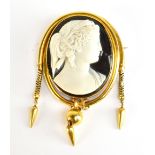 A Victorian carved agate cameo brooch of large size, with tassel drops and depicting a classical