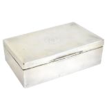 A George V hallmarked silver cigarette case of rectangular form, Chester 1917, length 14cm (af).