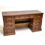 A Victorian stained pine twin pedestal desk (for restoration), with one long and two short drawers