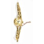 ROTARY; a lady's 9ct gold wristwatch, the circular face with Arabic numerals, with 9ct gold strap,