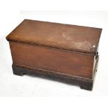 A stained wooden twin handled blanket chest.